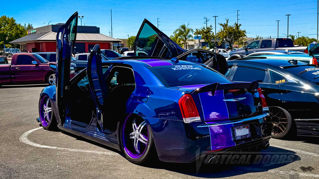 _sassyburrito_ Chrysler 300 from California showing off vertical lambo door conversion kit by Vertical Doors, Inc. she also rocking, vinyl wrap, custom lighting, airbags and many other upgrades, VDCCRY30011, Chrysler 300 Lambo Door Conversion Kit by Vertical Doors Inc., Chrysler 300, 300, 300c, Chrysler, Mopar, 2ndgen, LD, SRT, 300s, hemi,
lambo doors, vertical doors, door conversion, scissor doors, butterfly doors, wing doors, Chrysler 300 lambo doors, Chrysler 300 vertical doors, Chrysler 300 door convers