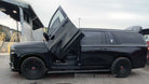 Lambo Door Hinge Conversion Kit compatible with 2021 – 2026 Cadillac Escalade by Vertical Doors, Inc., part number VDCCADESC1521, precision-engineered bolt-on vertical door system for luxury SUV applications.