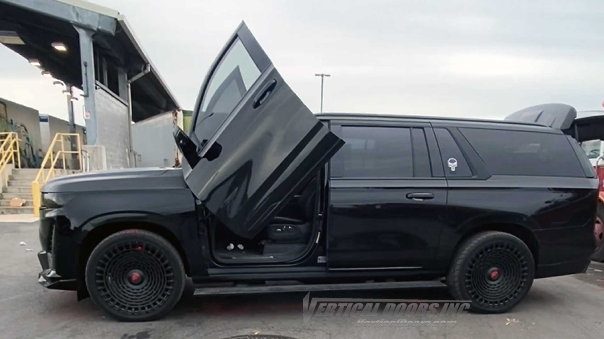 Lambo Door Hinge Conversion Kit compatible with 2021 – 2026 Cadillac Escalade by Vertical Doors, Inc., part number VDCCADESC1521, precision-engineered bolt-on vertical door system for luxury SUV applications.