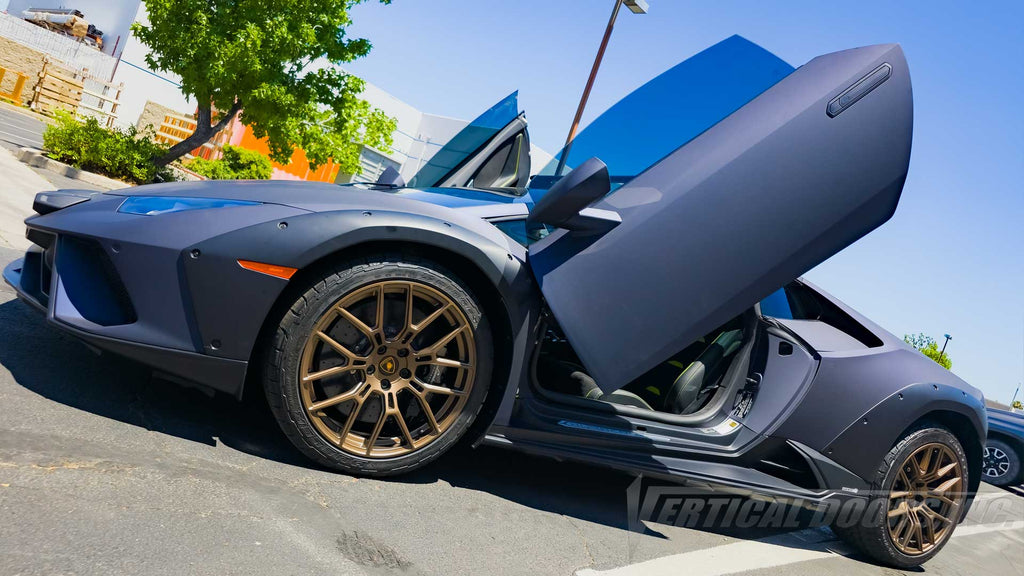 Lamborghini Huracán LP 610-4 Sterrato getting a lambo door conversion kit installed by Vertical Doors, Inc. in Lake Elsinore California.