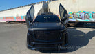 Check out @bxmoneymike 5th Gen 2023 Cadillac Escalade-V showing off Vertical Lambo Door kit by Vertical Door, Inc.