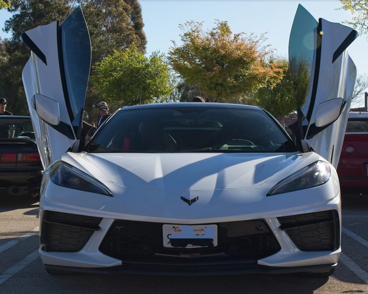 Willies white Chevrolet Corvette C8 with vertical door conversion kit  by Vertical Doors, Inc.